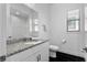Modern bathroom with granite countertops, sleek fixtures, and tile flooring for easy maintenance at 1543 Corolla Ct, Reunion, FL 34747