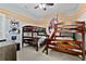 Fun ' bedroom with Star Wars decor, unique bunk beds, and a playful atmosphere at 1543 Corolla Ct, Reunion, FL 34747