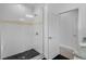 Tiled walk-in shower featuring sleek design, glass door, and modern fixtures with ample space at 1543 Corolla Ct, Reunion, FL 34747