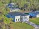 Aerial view of new construction home featuring a modern design and landscaping at 17135 Sw 41 Ct, Ocala, FL 34473