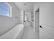 Elegant bathroom featuring a freestanding tub, a dual sink vanity and a tiled shower at 17135 Sw 41 Ct, Ocala, FL 34473