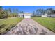 Beautiful new construction home featuring a brick driveway and a two-car garage at 17135 Sw 41 Ct, Ocala, FL 34473