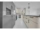 Modern kitchen features stainless steel appliances and a large island at 17135 Sw 41 Ct, Ocala, FL 34473