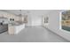 Open-concept kitchen with a large island and stainless steel appliances at 17135 Sw 41 Ct, Ocala, FL 34473