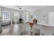 Open living room with neutral colors, offering ample space, natural light, and stylish furnishings at 1817 Snaresbrook Way, Orlando, FL 32837