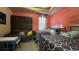 Bedroom with two beds, pullout couch, table, and scripture decor at 1855 Partin Terrace Rd, Kissimmee, FL 34744