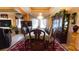 Sophisticated dining room with an elegant chandelier, ample seating, and beautiful decor for memorable gatherings at 1855 Partin Terrace Rd, Kissimmee, FL 34744