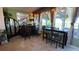 Charming sunroom with lots of natural light and cozy bar area at 1855 Partin Terrace Rd, Kissimmee, FL 34744