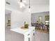 Open concept kitchen with bright lighting and a view of the dining area at 2555 Sweetwater Trl, Maitland, FL 32751