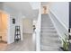 Inviting foyer with staircase leading to the upper level at 261 Whistling Duck Trl, St Cloud, FL 34771