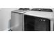 Modern laundry room featuring front loading washer and dryer at 261 Whistling Duck Trl, St Cloud, FL 34771