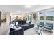 Bright and open living area with kitchen and dining views, modern décor, and ample seating at 261 Whistling Duck Trl, St Cloud, FL 34771