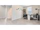 Neutral-toned office space offering tile flooring and a work desk at 261 Whistling Duck Trl, St Cloud, FL 34771