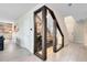 Unique wine cellar built under the stairs with custom wood and glass enclosure at 261 Whistling Duck Trl, St Cloud, FL 34771