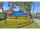 Attractive Lakehurst community sign with brick base, flower beds, manicured lawn, and mature trees at 2954 Willow Bay Ter, Casselberry, FL 32707