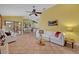 Expansive living space featuring tile flooring, an open layout, and access to outdoor living areas making it perfect for entertaining at 2954 Willow Bay Ter, Casselberry, FL 32707