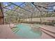 The screened-in pool and spa offer a relaxing outdoor retreat, surrounded by well-maintained landscaping at 2954 Willow Bay Ter, Casselberry, FL 32707