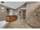 Bathroom with a glass enclosed shower, double vanity with granite countertop and a toilet at 2991 Timpana Pt, Longwood, FL 32779