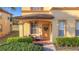 Inviting front porch with seating area and decorative touches at 4103 Calabria Ave, Davenport, FL 33897