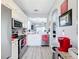 Modern kitchen featuring stainless steel appliances and an open layout at 4103 Calabria Ave, Davenport, FL 33897