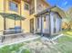 Outdoor patio featuring an umbrella, table with seating, and a view of the screened patio area at 4103 Calabria Ave, Davenport, FL 33897