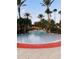Large community pool featuring a slide and ample space for swimming and recreation at 4103 Calabria Ave, Davenport, FL 33897