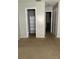 Carpeted bedroom featuring closet with shelving at 4215 S Semoran Blvd # 2, Orlando, FL 32822