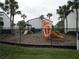 Community playground with slides and climbing structures, a fun and safe place for to play at 4215 S Semoran Blvd # 2, Orlando, FL 32822