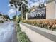 Welcome to Avalon Condominiums. Community sign surrounded by lush landscaping at 4215 S Semoran Blvd # 2, Orlando, FL 32822