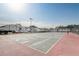 Community tennis court is ready for friendly matches and active recreation under the open sky at 4215 S Semoran Blvd # 2, Orlando, FL 32822