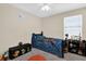 Playful bedroom with toys and a bright blue Spiderman comforter at 429 N Andrea Cir, Haines City, FL 33844