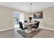 Modern dining room with sliding glass doors and views of the backyard at 429 N Andrea Cir, Haines City, FL 33844
