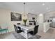 Contemporary dining area, showcases modern furnishings, chandelier and open space for entertaining at 429 N Andrea Cir, Haines City, FL 33844