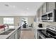 Well-designed kitchen open to dining area, perfect for entertaining and Gathering gatherings at 429 N Andrea Cir, Haines City, FL 33844