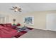 Comfortable living room featuring a mounted television and neutral wall colors at 429 N Andrea Cir, Haines City, FL 33844