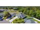 Beautiful aerial view of a home with a well-maintained yard and mature trees in a desirable neighborhood at 4919 Culdesac Ct, St Cloud, FL 34772