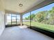 Enclosed screened lanai overlooking the backyard offering a private outdoor living space at 4919 Culdesac Ct, St Cloud, FL 34772
