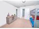 Bedroom features a bunk bed, a window, a dresser, and carpeted floors at 5156 Caspian St, St Cloud, FL 34771