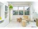 Cozy sitting area with comfortable chair, plants, and decorative accents by a window at 5156 Caspian St, St Cloud, FL 34771