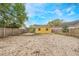 The backyard is enclosed by a wood fence, providing privacy for outdoor activities and relaxation at 5424 Blue Grass St, Orlando, FL 32810