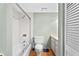 Well-lit bathroom featuring a shower-tub and a vanity with storage at 543 Fairways Dr # B, Ocala, FL 34472