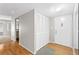 Entryway view featuring a coat closet, hardwood floors, and gray walls at 543 Fairways Dr # B, Ocala, FL 34472