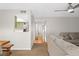 Open concept featuring living room, dining room and kitchen with hardwood and carpet at 543 Fairways Dr # B, Ocala, FL 34472