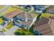 This aerial shot showcases a large lawn and home, offering privacy and plenty of outdoor space for activities at 5709 Sagunto Dr, Davenport, FL 33897