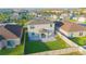 Expansive backyard features a covered patio and well-maintained lawn, great for relaxing and enjoying the outdoors at 5709 Sagunto Dr, Davenport, FL 33897