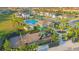 A nice view of the community pool and playground area, surrounded by lush landscaping and well-maintained grounds at 5709 Sagunto Dr, Davenport, FL 33897