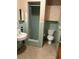 Cozy bathroom with a shower and commode at 6 Barnard Ct, Maitland, FL 32751