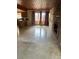 Spacious living room with a wood ceiling, fireplace, and expansive views from large windows at 6 Barnard Ct, Maitland, FL 32751
