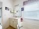 Bathroom with vanity, tub, white walls, and tiled floors at 603 Russ Pond Dr, Kissimmee, FL 34759