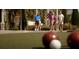 Active scene of people enjoying bocce ball on a well-maintained outdoor court with lush landscaping at 603 Russ Pond Dr, Kissimmee, FL 34759